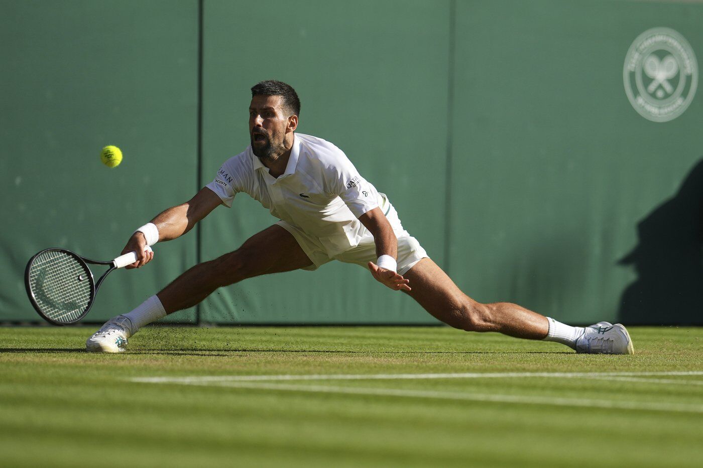Novak Djokovic reaches a record 14th Wimbledon semifinal and faces No. 1 Jannik Sinner next